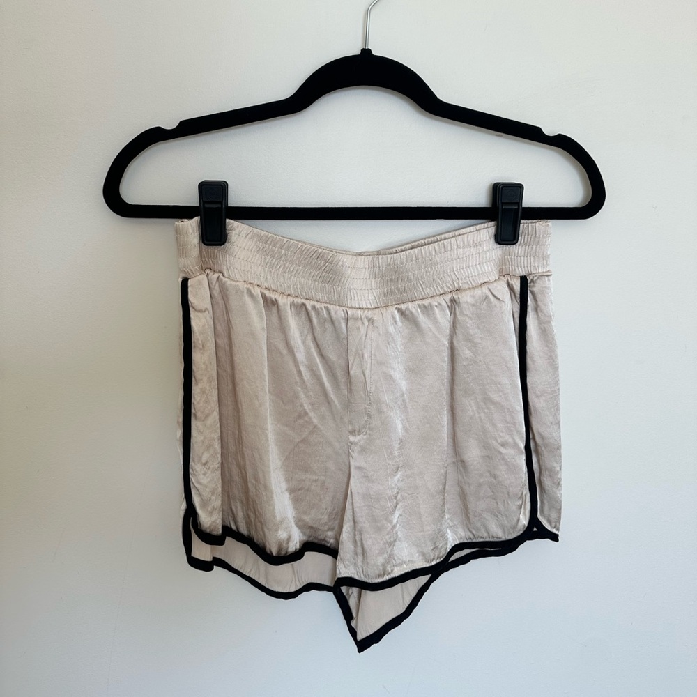 Satin pink shorts with black detail